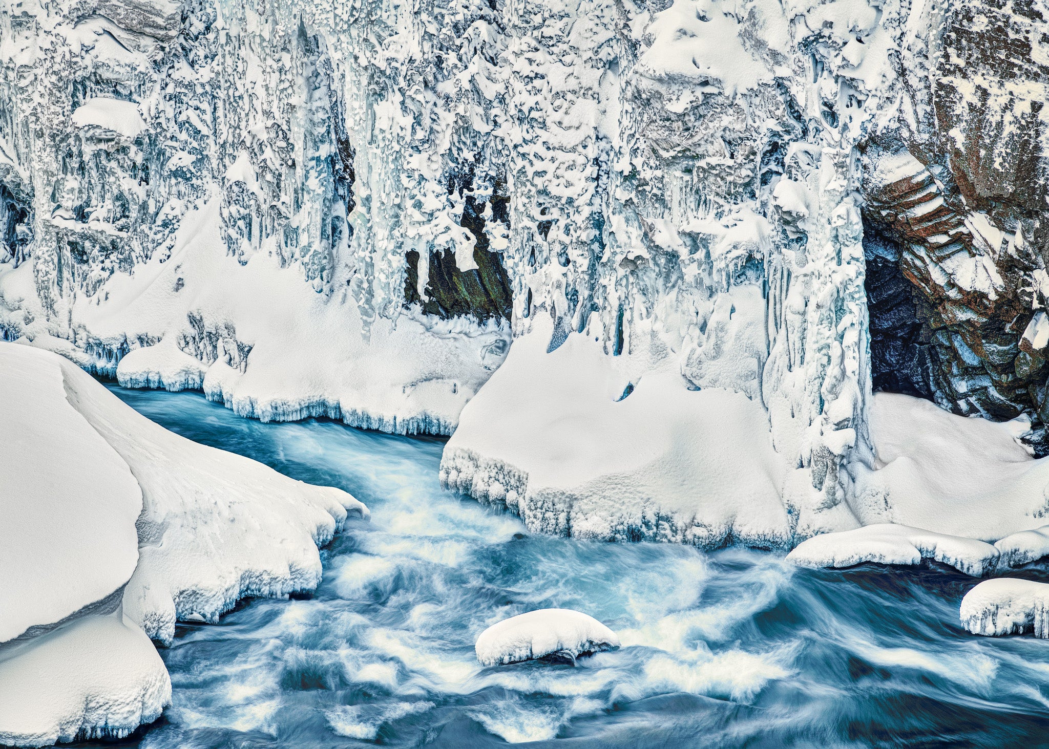 Winter&#39;s Flow: Intricate Ice Patterns in Iceland’s North